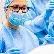 Doctor about to begin operation on a pregnant woman in surgery