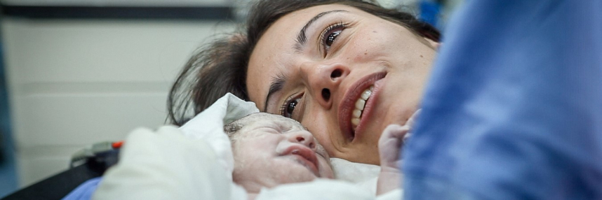 Woman and newborn baby