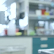 genomics lab with person working in background