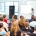 A group of people in a lecture room