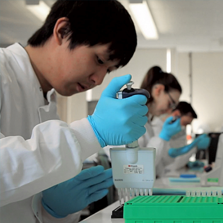 Colleagues working in an NHS genomics laboratory