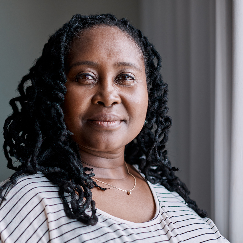 Black female looking at camera with smile