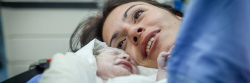 Woman and newborn baby